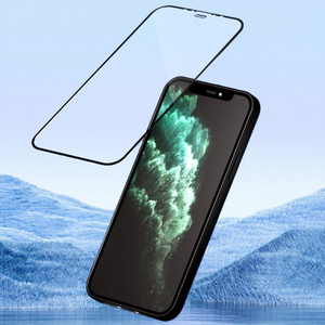 A smartphone with a green swirling wallpaper is shown with an AndyQ iPhone 12/Pro high definition tempered glass screen protector hovering above it. The background consists of a blue, wavy, abstract landscape.